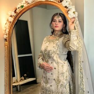 Timeless Beauty - Off-White Pishwas with Exquisite Embroidery and Embellishments